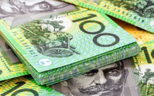 Australijski dolar utrzymuje kurs na wzrost